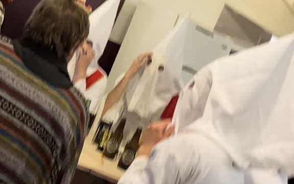 Quiz contestants at the Kaimai Settlers Committee fundraiser 19 August 2023 dressed as Ku Klux Klan KKK complete with petrol can
picture supplied