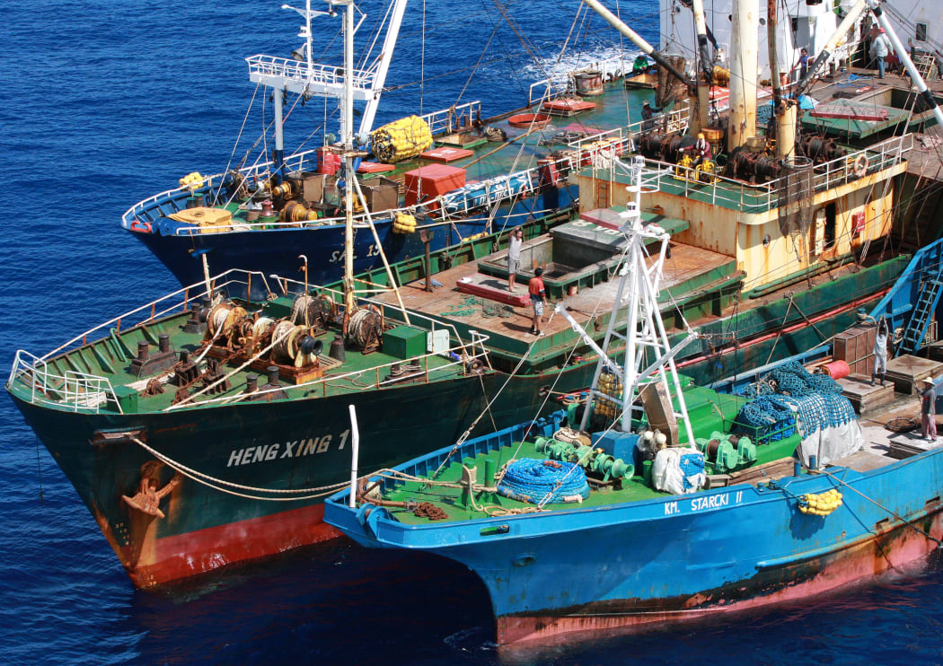 An illegal transshipment is seen taking place on board the ship 'Heng Xing 1' in an area of international waters near the exclusive economic zone of Indonesia.