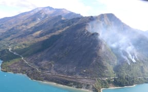Helicopters have been used to battle the Glenorchy blaze.