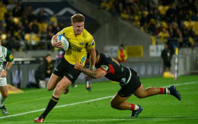 Jordie Barrett of the Hurricanes makes a run during Super Rugby Pacific, 2024.