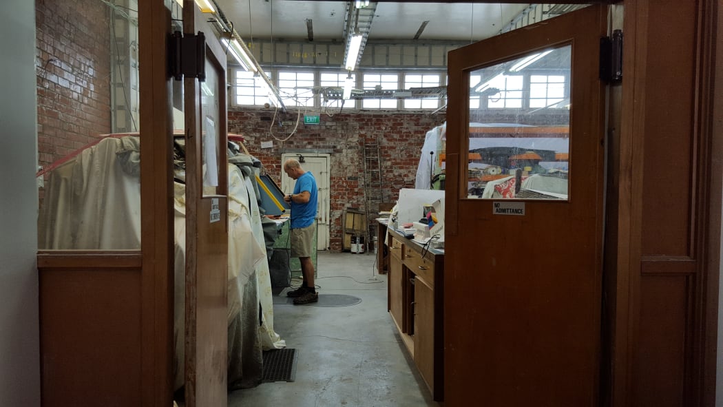 Joe Arts at work in his printing business in High Street.