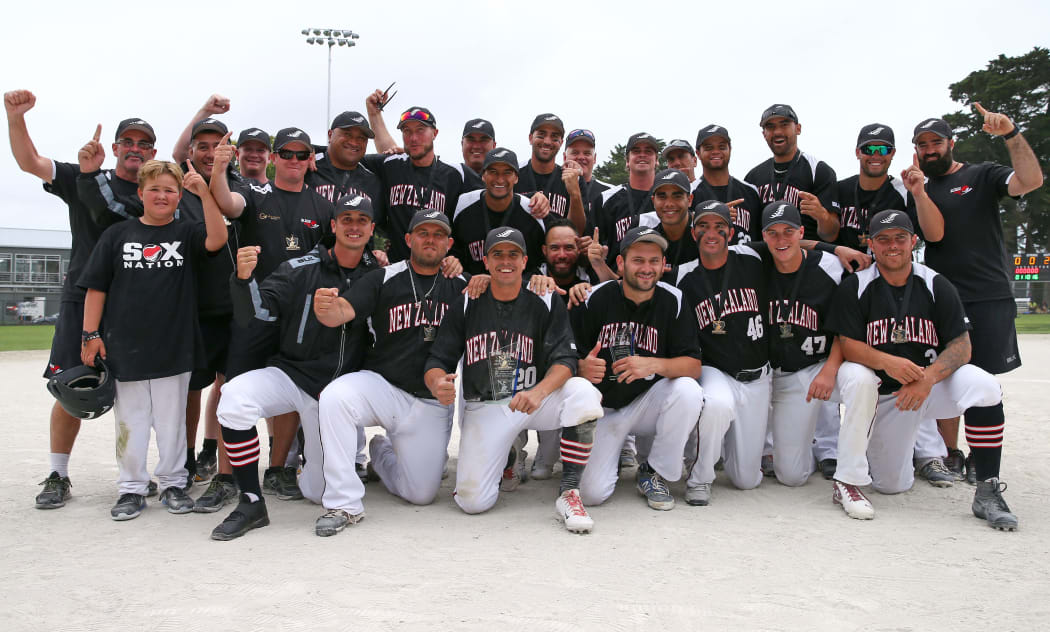 The Black Sox pose with the Challenge Cup trophy.
