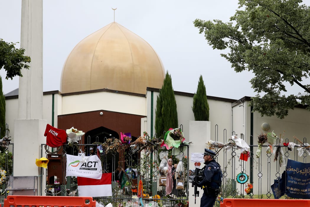 An armed police officer outside Al Noor Mosque in Christchurch, April 2019.