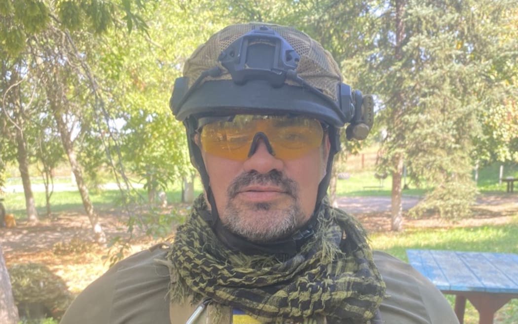 A man wearing military gear