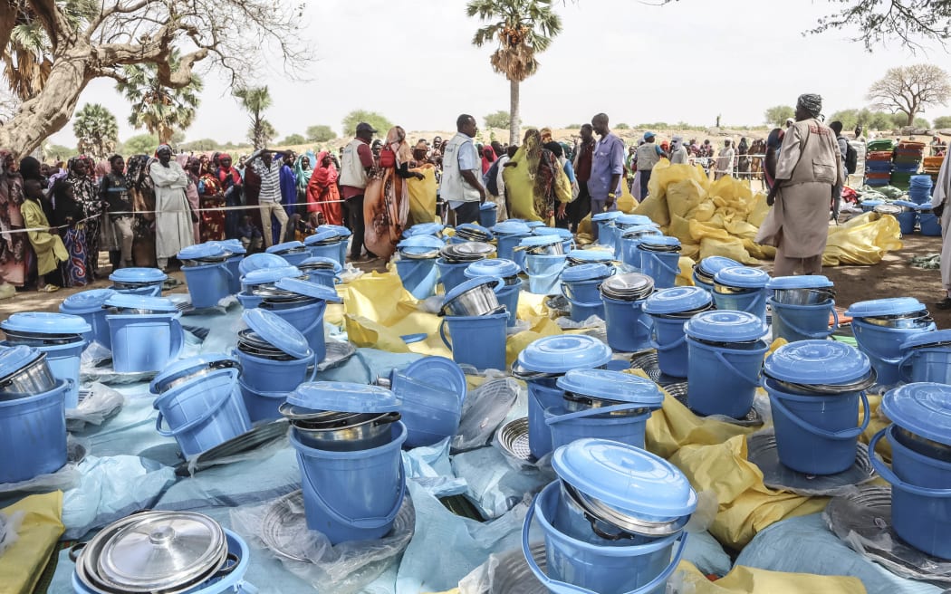 Personnel from the United Nations Children's Fund (UNICEF) and from the NGO Premiere Urgence prepare aid kits for Sudanese refugees from the Tandelti area who crossed into Chad, in Koufroun, near Echbara, on 30 April, 2023.