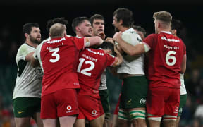South Africa's Eben Etzebeth (3R) and Wales' flanker Alex Mann (4L) clash during the test at Cardiff.
