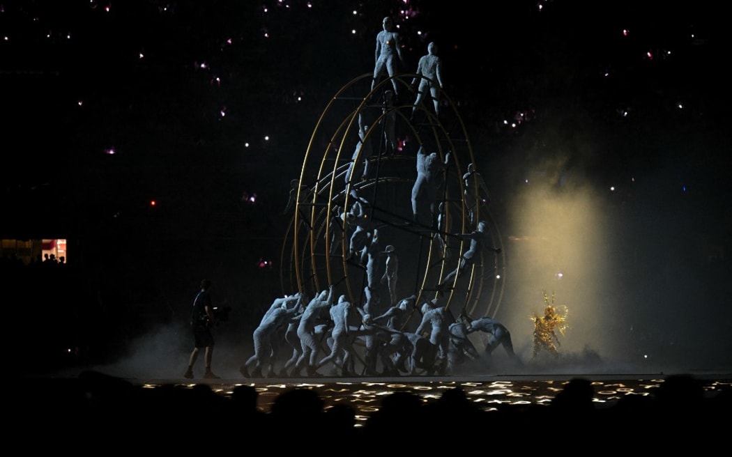 Dancers perform during the closing ceremony of the Paris 2024 Olympic Games at the Stade de France, in Saint-Denis, in the outskirts of Paris, on August 11, 2024. (Photo by Oli SCARFF / AFP)