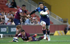 Ma'a Nonu makes a break against the Reds in Brisbane.