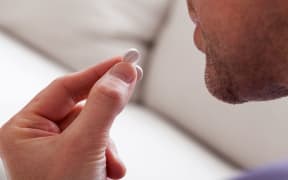 Man taking medication
