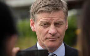Bill English at a social housing announcement in Northcote