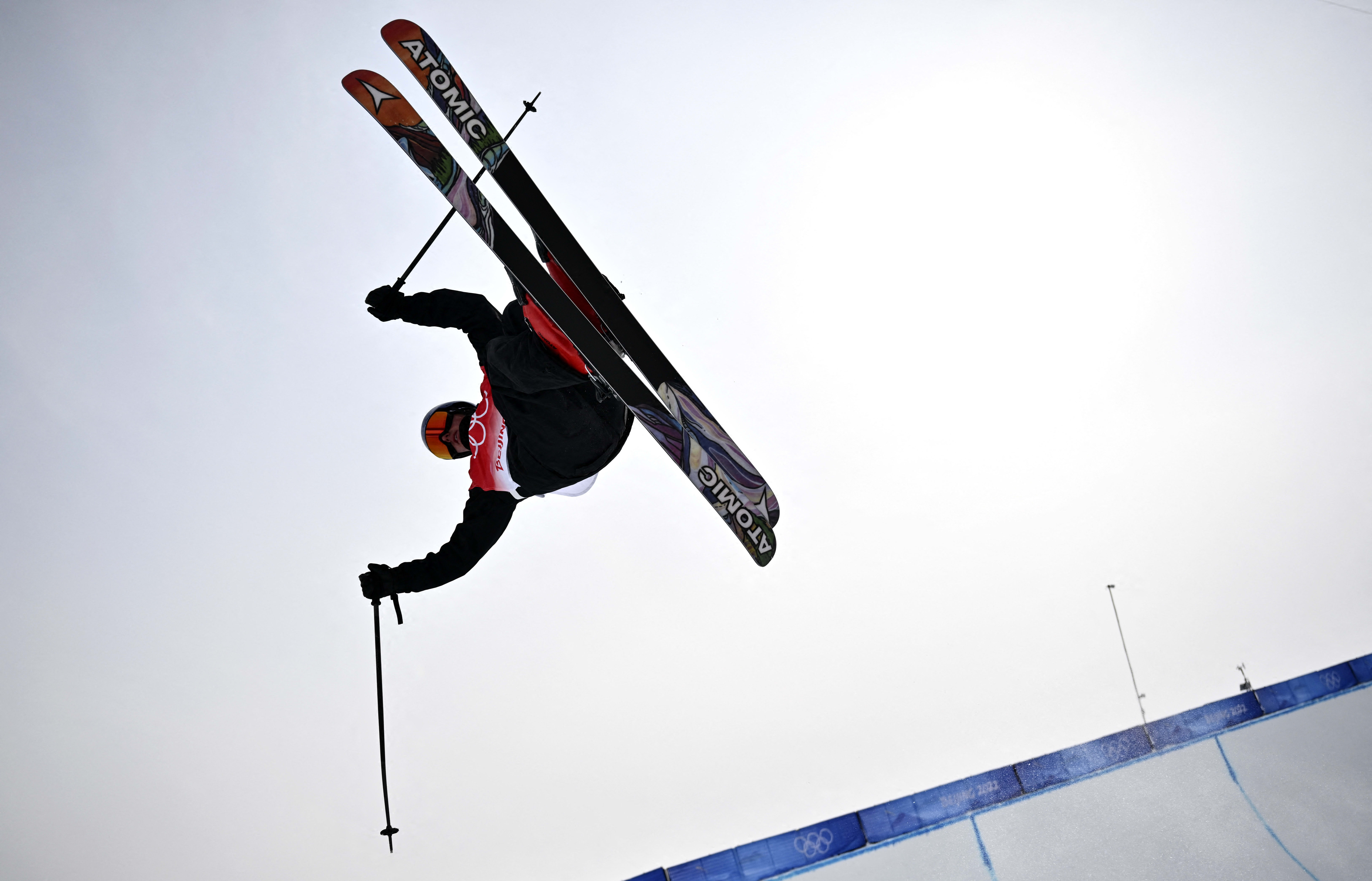 New Zealand's Nico Porteous practices before the start of the freestyle skiing men's freeski halfpipe qualification run during the Beijing 2022 Winter Olympic Games on February 17, 2022.