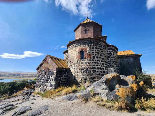For use with summer feature -  Former New Plymouth councillor John McLeod and partner Susie Rosser at Armenia's Monastery of Geghard, a World Heritage site featuring remarkable medieval rock-cut churches and tombs.