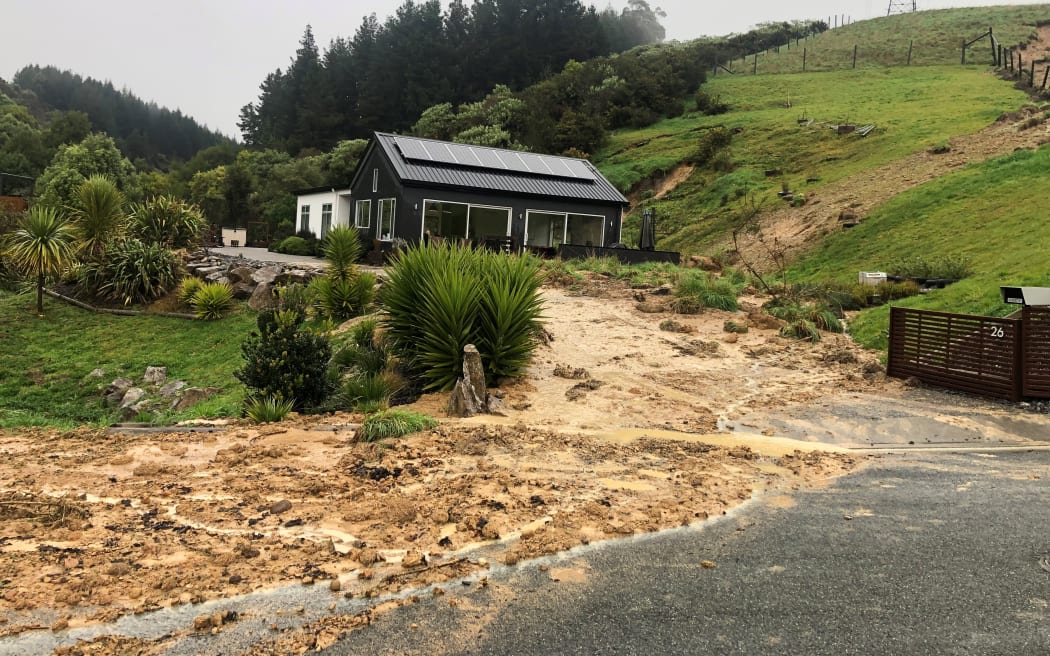 Scott May's house with the landslip to the right that occurred on August 16, 2022.