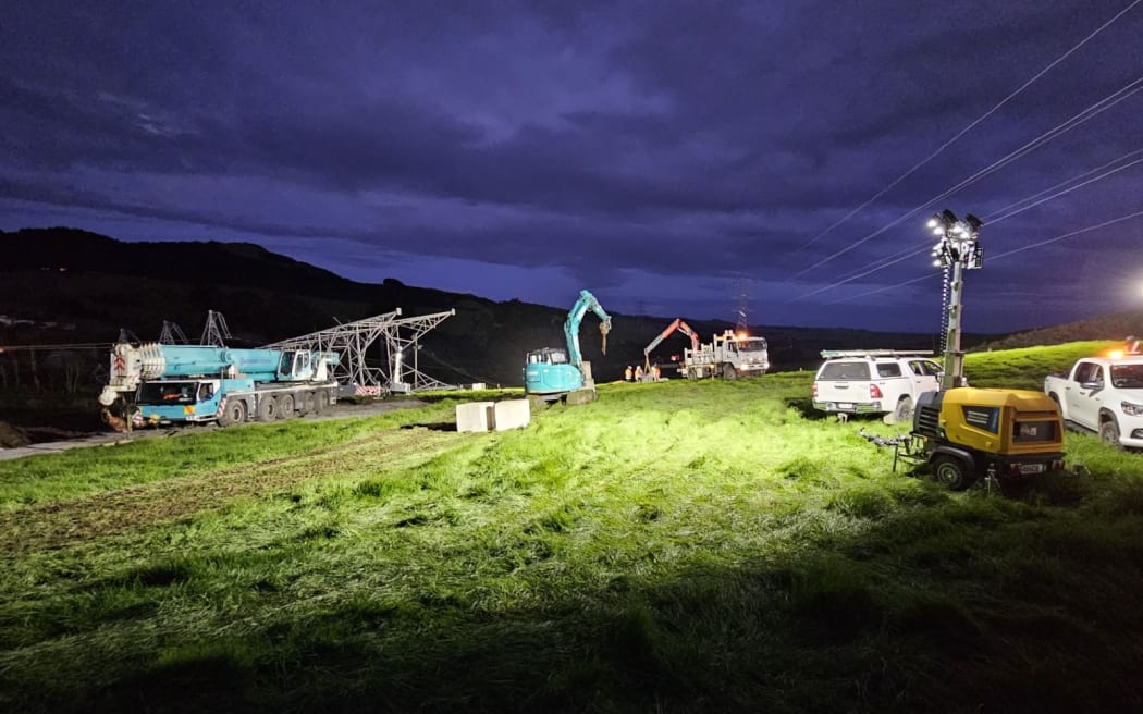 Transpower crews working at dawn on 21 June, preparing to install a temporary tower after a fallen pylon cut power to thousands of Northland properties.