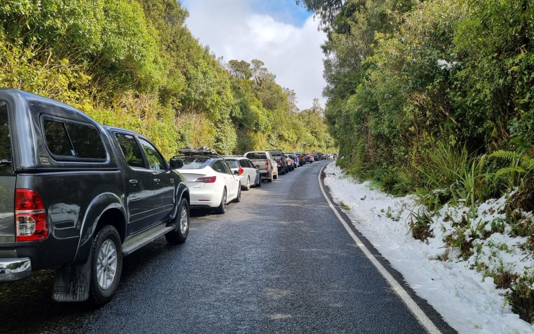 Cars were lined up for more than two kilometres while the road was closed and parking was at a premium at the Stratford Plateau.