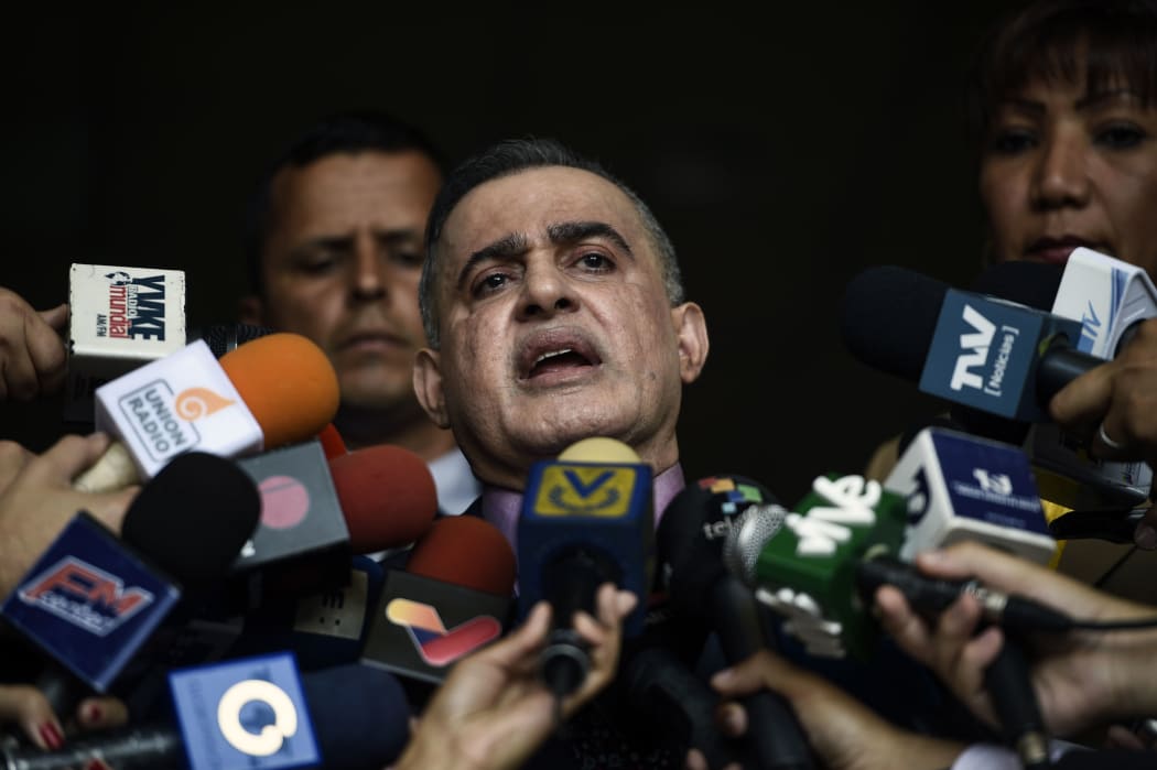 Venezuelan Prosecutor Tarek William Saab, delivers a statement at the Supreme Court of Justice in Caracas to announce he has asked the Supreme Court to bar Venezuela's self-proclaimed "acting president" Juan Guaido, from leaving Venezuela and to freeze his assets.