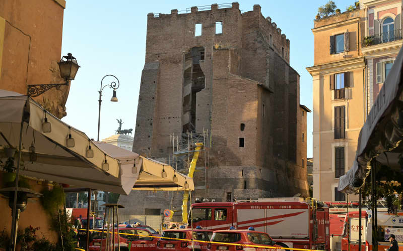 Worker trapped under collapsed medieval tower in Rome dies, media says ...