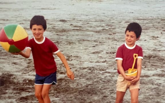 Sean (left, with beach ball) and Glen Scanlon at Carters Beach, Westport.