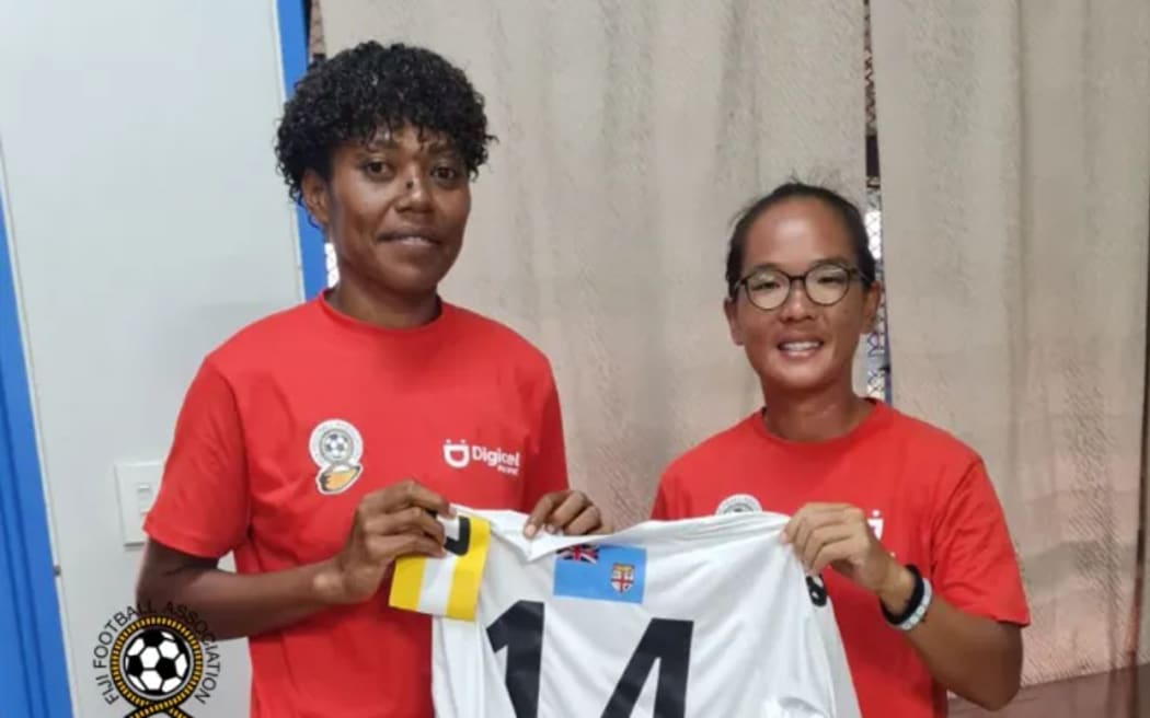 Fijian Kula captain Cema Nasau receives her jersey from coach Angeline Chua in Ba on Sunday. 4 February 2024