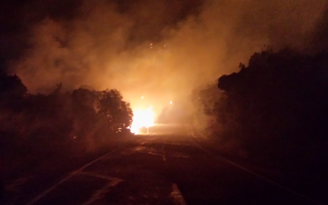 The blaze has completely cut off road access to the town.