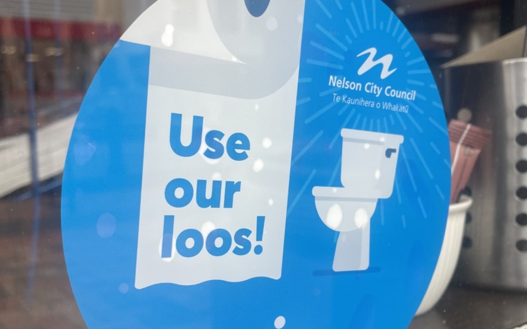 A 'use our loos!' sticker for businesses in Nelson.