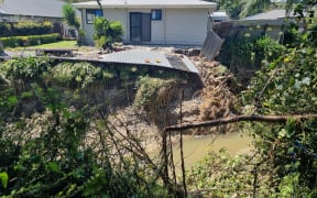 Houses on Joll Road in Havelock North were inundated with contaminated mud during Cyclone Gabrielle, but the community and Navy pitched in to help clean up the street and homes.