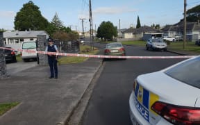 Armed police are protecting a large cordon in Mt Roskill where a person was stabbed and killed last night.