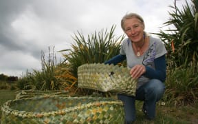Katarina Tawiri with wahakura flax bassinets