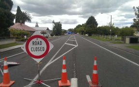 The main road through Clive has been closed off and three tents set up as police examine the scene of the shooting.