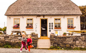 Kylee and Liam Dillane's children Emilia and Brielle outside a cafe in Inishmore.