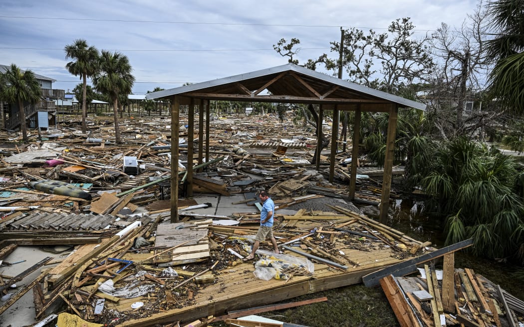 Bo Hester assesses damages to his house after Hurricane Helene made landfall in Horseshoe Beach, Florida, on 28 September, 2024.