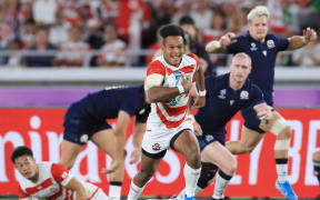 Kotaro Matsushima of Japan tries in the first half of the Rugby World Cup Pool A match against Scotland at International Stadium Yokohama in Yokohama City, Kanagawa Prefecture on October 13, 2019.
