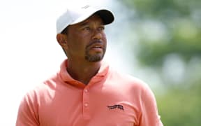 Tiger Woods watches his shot during the first round of the PGA Championship, 2024.