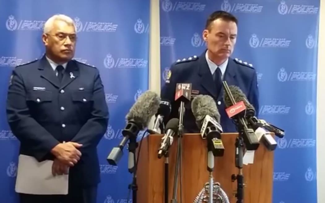 Inspector Willi Fanene and Inspector Mark Fergus talking to the media.