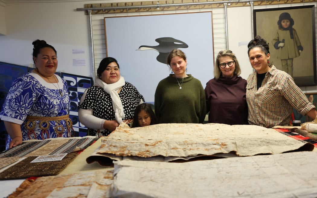 Led by head conservator Carolina Izzo, 2nd right, the studio is dedicated to maintaining taonga - cultural treasures.