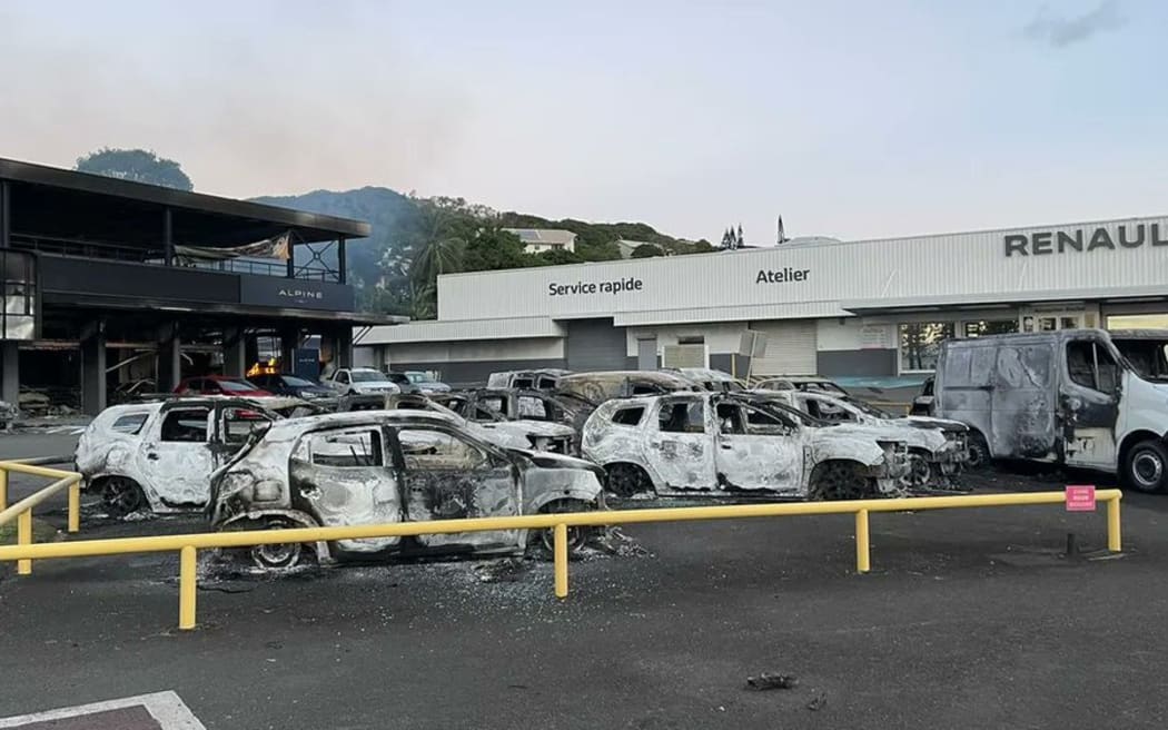 Burnt out cars in New Caledonia on 14 May, 2024.