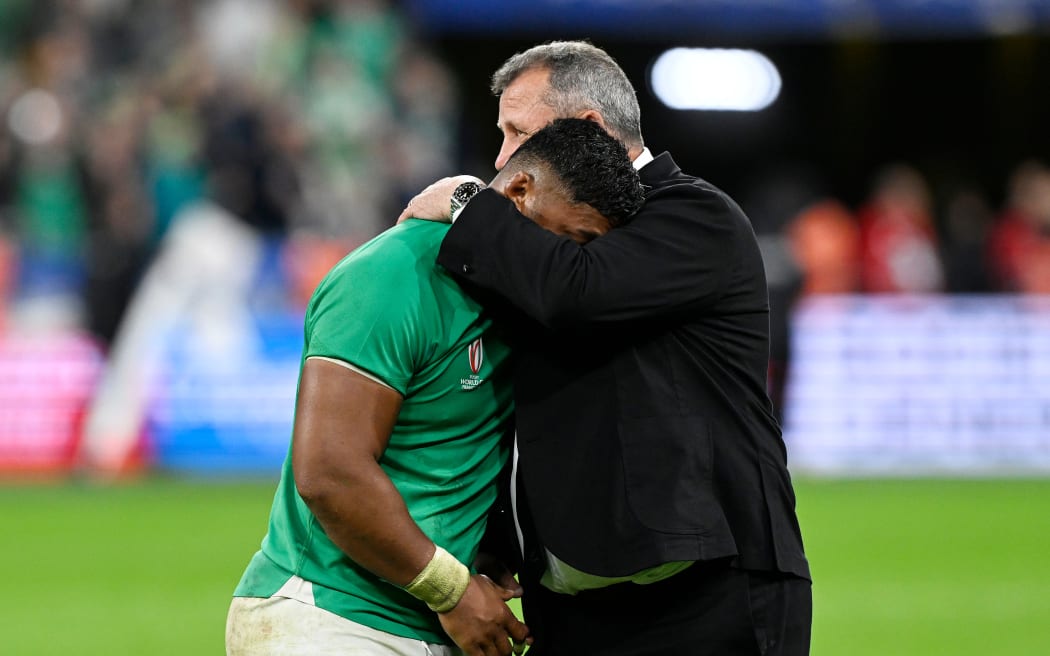 New Zealand head coach Ian Foster hugs Ireland player Bundee Aki after losing the Quarter Final match Ireland v New Zealand All Blacks at the Rugby World Cup France 2023. Stade de France, Saint-Denis, France on Saturday 14 October 2023. Photo credit: Andrew Cornaga / www.photosport.nz