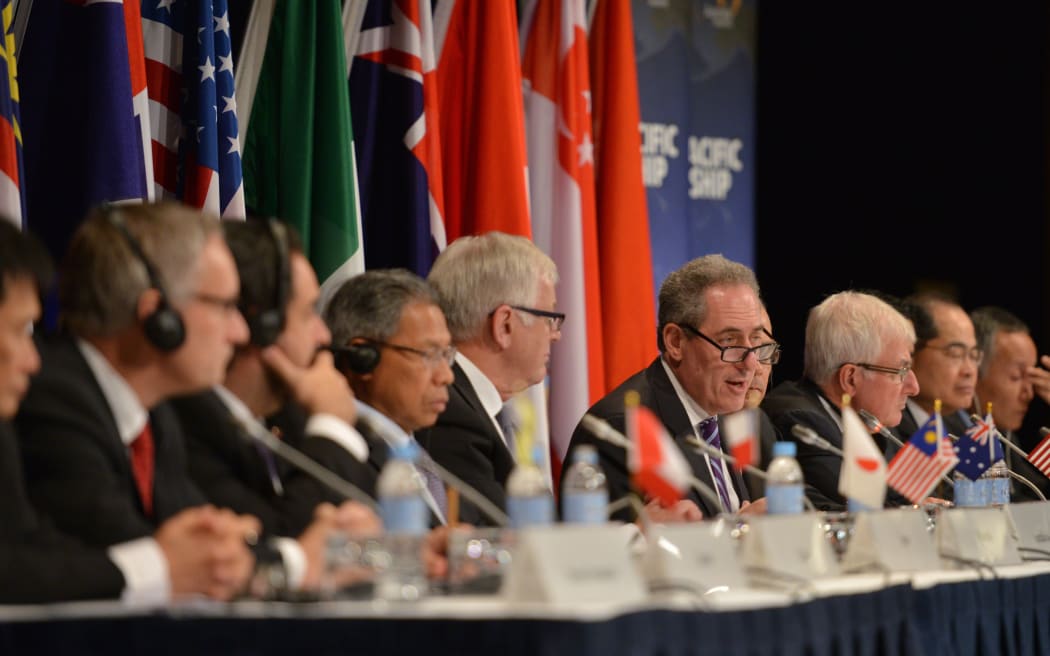 US Trade Representative Mike Froman (C) speaks at a press conference for the Trans-Pacific Partnership (TPP), in Sydney last year.