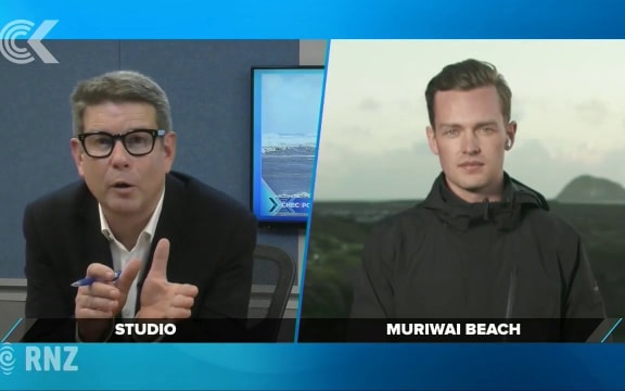 Two people die after being swept off rocks into sea