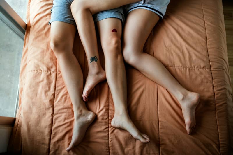 Couple in bed together.