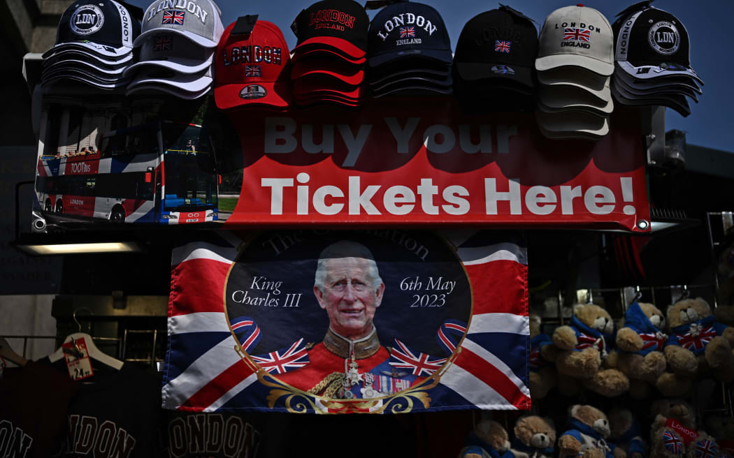 A Coronation-themed Union flag is pictured at a souvenir stall near Houses of Parliament in central London, on May 3, 2023, as preparations continue ahead of the May 6 Coronation of King Charles III. (Photo by Ben Stansall / AFP)