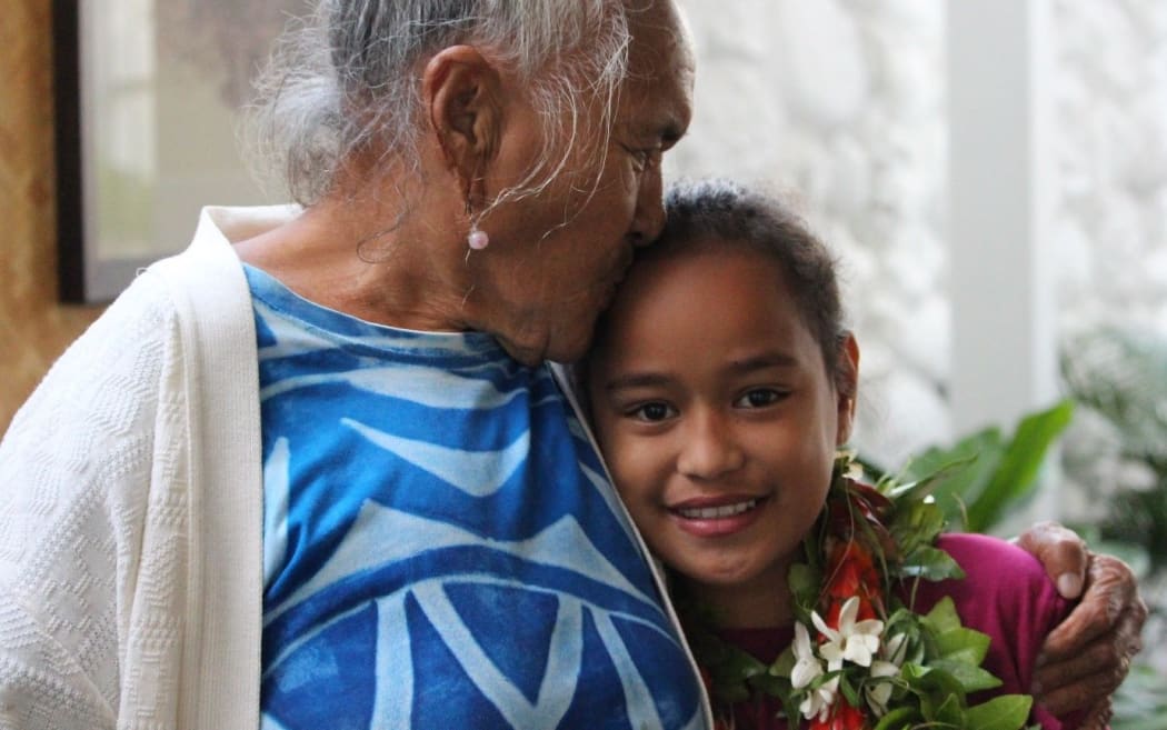 Ngatupuna Raela reunited with a family member at Rarotonga Airport.