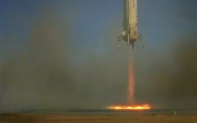 This Blue Origin handout photo shows New Shepard landing in West Texas on 13 October, 2020, with the NASA Lunar Landing Sensor Demo on board.