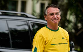 RJ - Rio de Janeiro - 10/02/2022 - ELECTIONS 2022, RIO DE JANEIRO, JAIR BOLSONARO - Reelection candidate Jair Bolsonaro (Liberal Party) is seen in the electoral zone in Vila Militar this Sunday (02), voting day in election campaign for president, governor, senator, and deputies. Photo: Thiago Ribeiro/AGIF (Photo by Thiago Ribeiro / AGIF / AGIF via AFP)