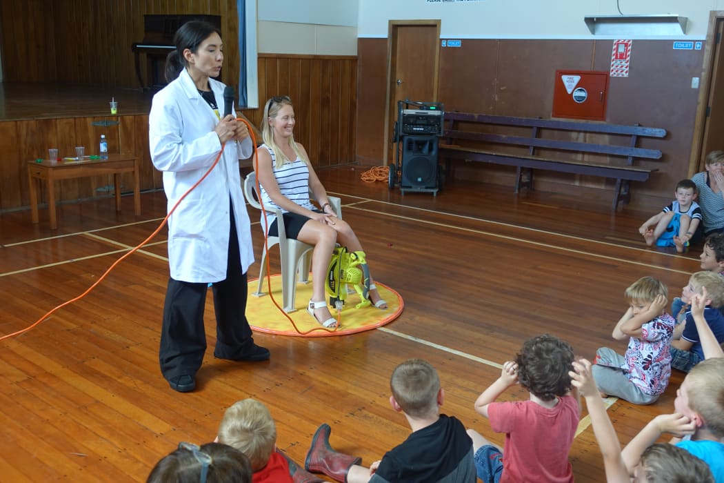 Lepperton teacher Katy Barnett tests out the flying hoverboard