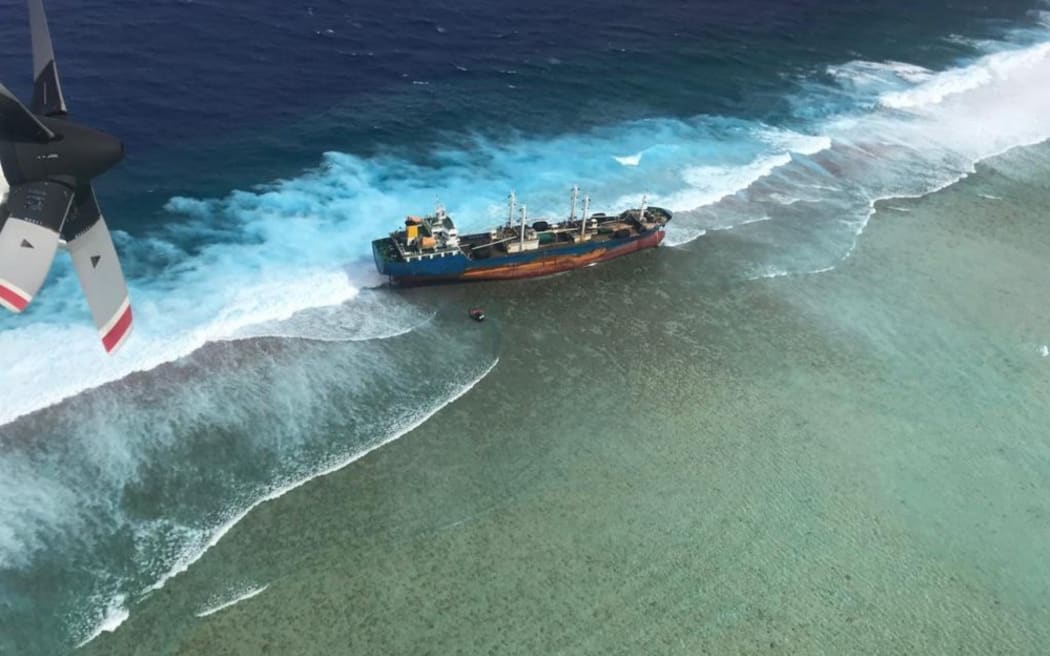 This file photo from January 2019 shows the fishing supply vessel Ou Ya Leng 6 hard aground on the reef at Taka Atoll in the northern Marshall Islands, where it remains today. Photo: US Coast Guard.