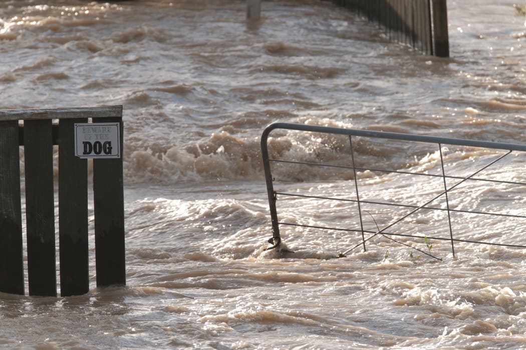 Flood water flowing in Edgecumbe.