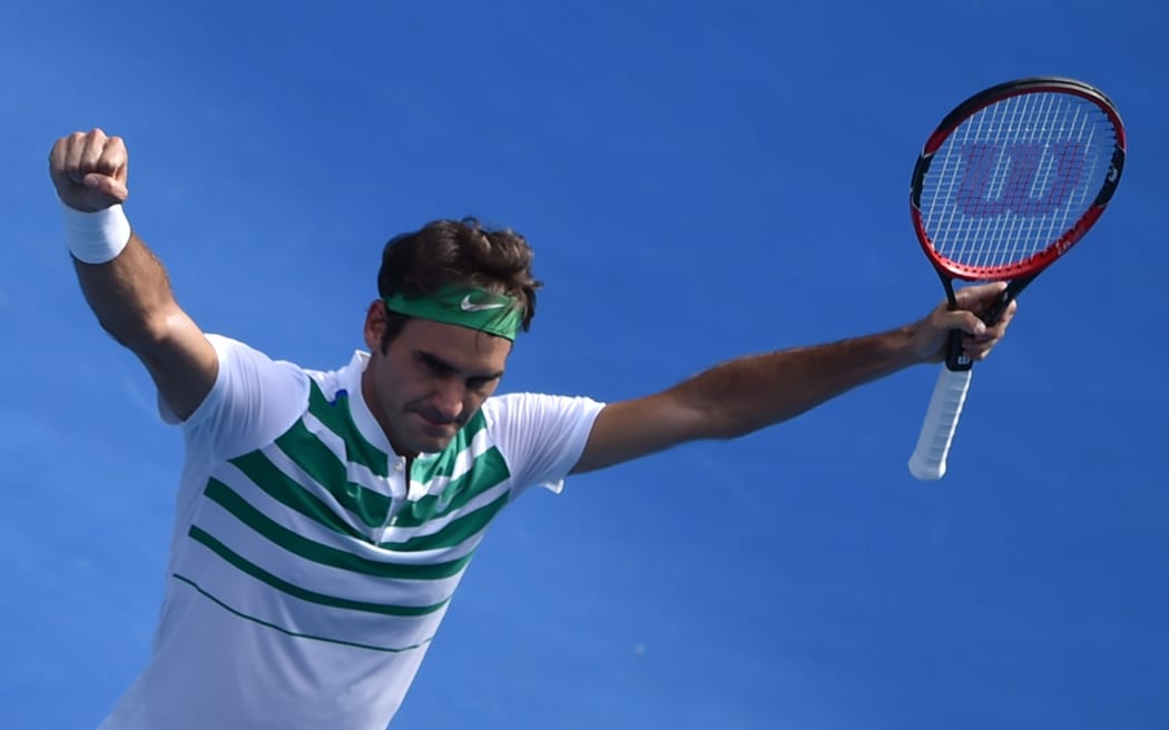 Roger Federer celebates after beating Tomas Berdych in the Australian Open.