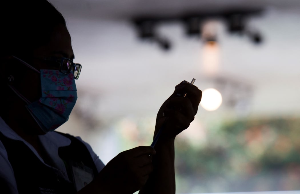Free application, at the Vasconcelos Library, of the second dose of the Pfizer vaccine against COVID-19, for people from 40 to 49 years who live in the Miguel Hidalgo borough in Mexico City, Mexico, on July 14, 2021.
