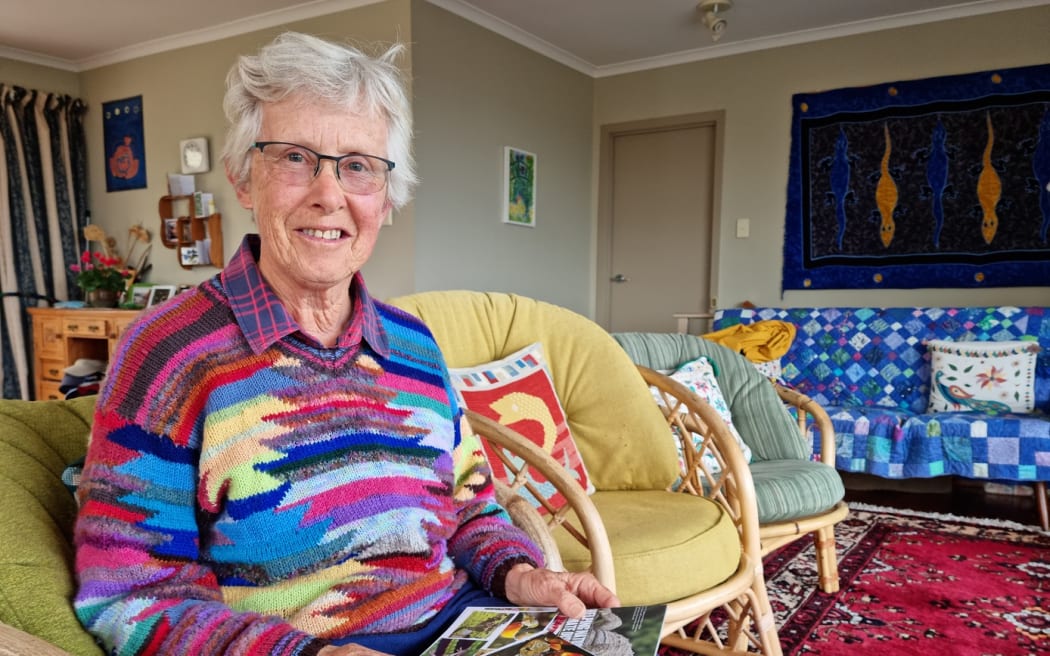 Nelson Tasman Climate Forum member Jenny Easton with postcards she has made to send to MPs